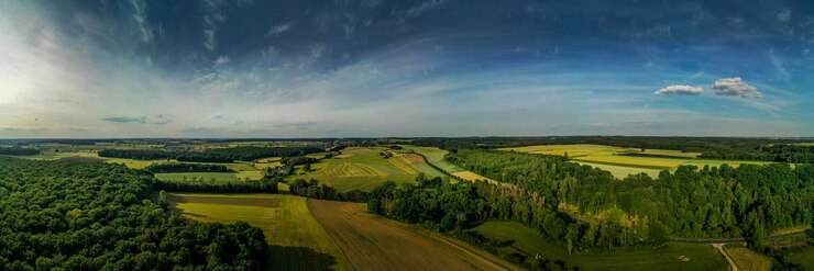 Photo vue panoramique d'un champ agricole contre le ciel