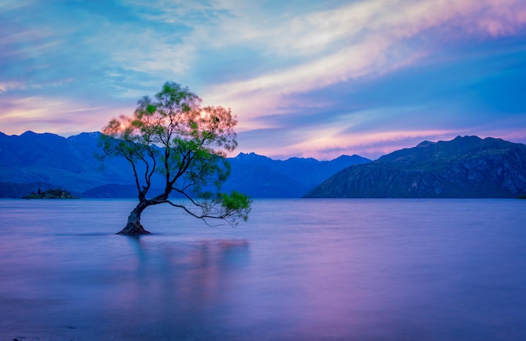 Photo vue panoramique du lac contre le ciel au coucher du soleil