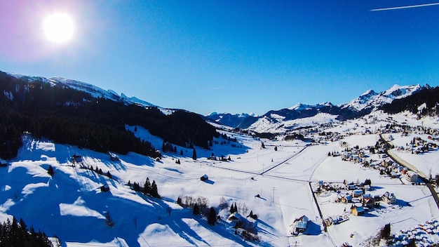 Photo vue panoramique du paysage contre le ciel bleu en hiver