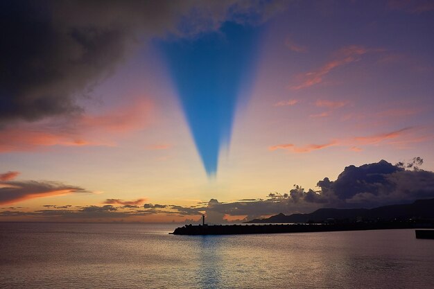 Photo vue panoramique de la mer contre le ciel au coucher du soleil