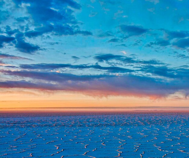 Photo vue panoramique de la mer contre le ciel au coucher du soleil