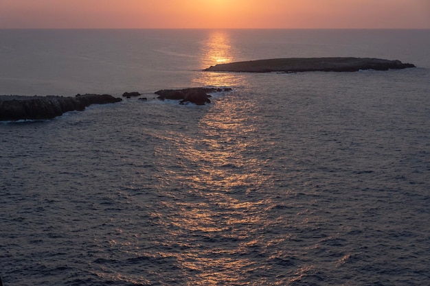 Photo vue panoramique de la mer contre le ciel au coucher du soleil