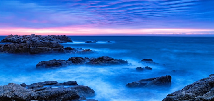 Photo vue panoramique de la mer contre le ciel au coucher du soleil