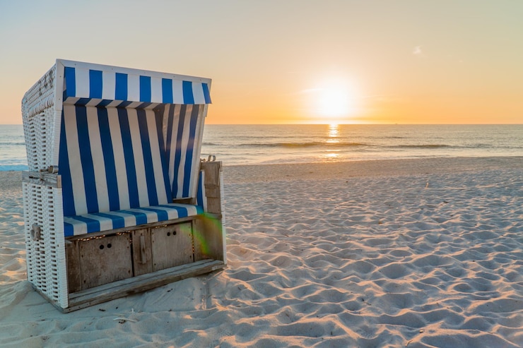 Photo vue panoramique de la plage contre le ciel au coucher du soleil