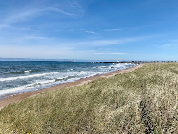 Photo vue panoramique de la plage contre le ciel