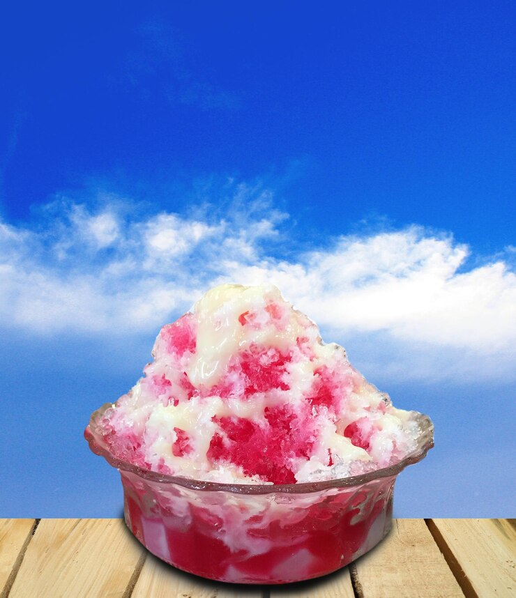 Photo vue rapprochée de la crème glacée sucrée sur la table contre le ciel bleu