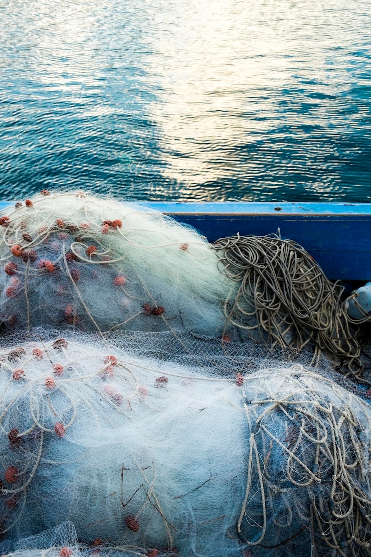 Photo vue rapprochée du filet de pêche sur un navire