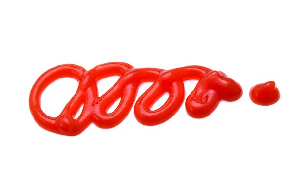 Photo vue rapprochée du ketchup sur fond blanc