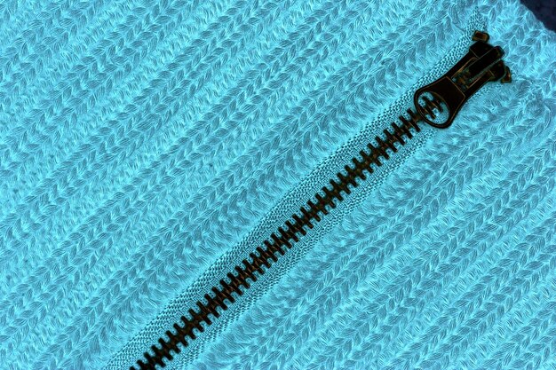 Photo vue rapprochée d'une fermeture à glissière noire sur un pull