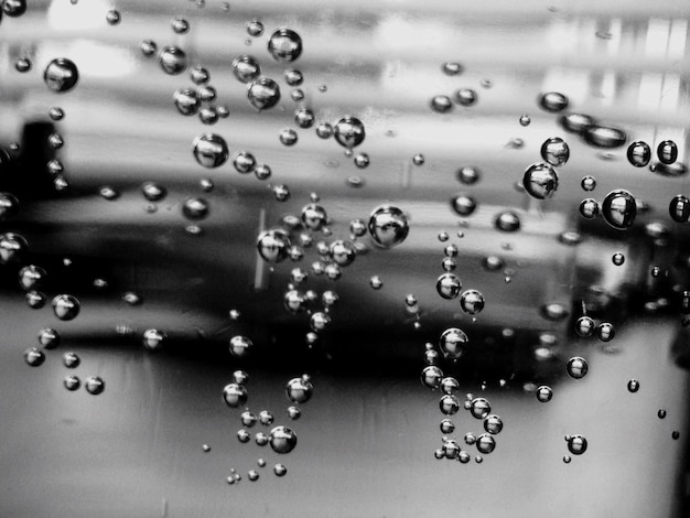 Photo vue rapprochée des gouttes d'eau sur le verre