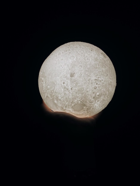 Photo vue rapprochée de la lune sur un fond noir
