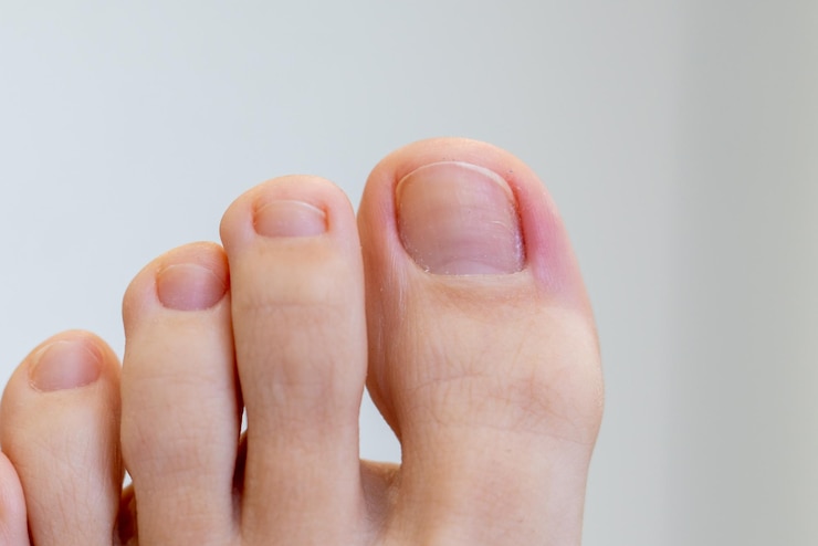 Photo vue rapprochée des pieds et des orteils féminins