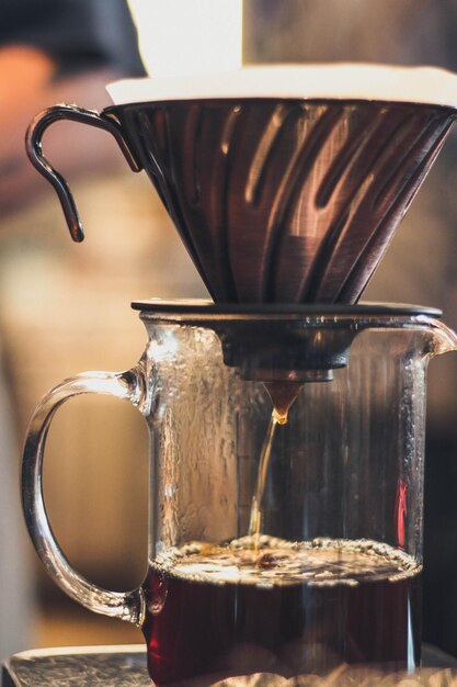 Photo vue rapprochée d'une tasse de café sur la table