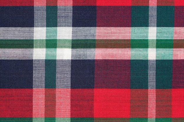 Photo vue rapprochée d'un tissu de tartan écossais traditionnel en couleurs rouge, bleu et vert image pour votre conception