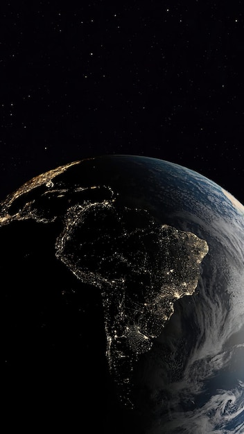 Photo vue satellite de nuit de l'espace au-dessus de l'amérique du sud avec les lumières rougeoyantes de ville