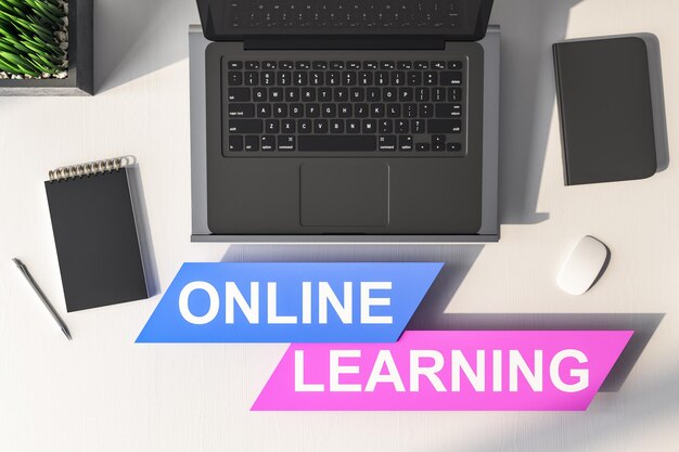Vue supérieure de l'ordinateur portable sur un lieu de travail minimaliste