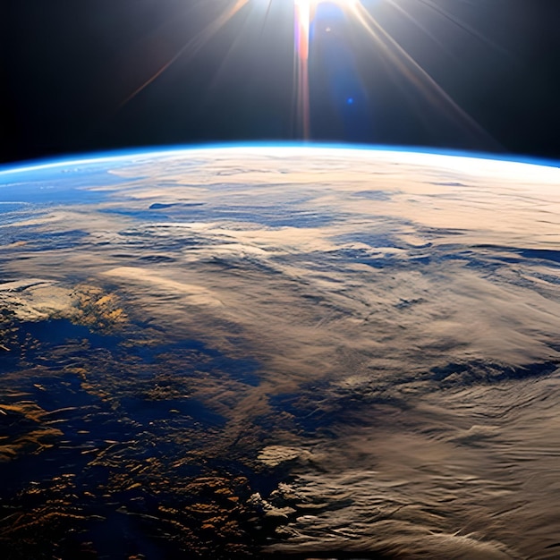 Photo une vue de la terre depuis l'espace avec le soleil qui brille à l'horizon.