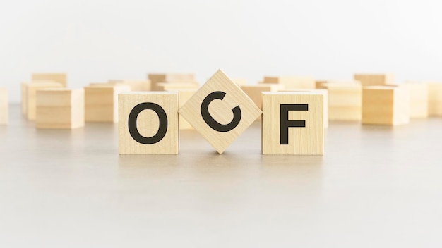 Word OCF est fait de blocs de bois sur fond blanc