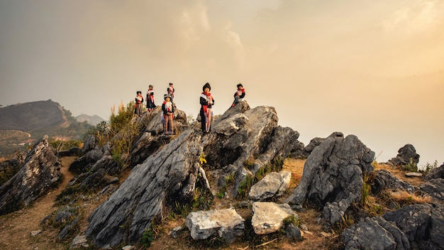 Yao Ou Mien Hill Tribe On Landscapes Sunrise Twilight Sky Over High 103 Mountains Viewpoint At Banphatang Village, Wiang Kaen District, Chiang Rai Province, Northwest Thailand.