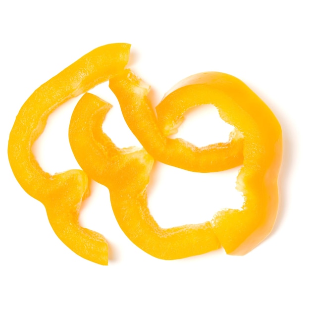 Photo yellow pepper slices isolated on white background cutout top view flat lay