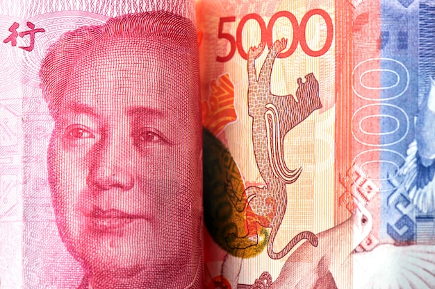 Yuan chinois et tenge kazakh.