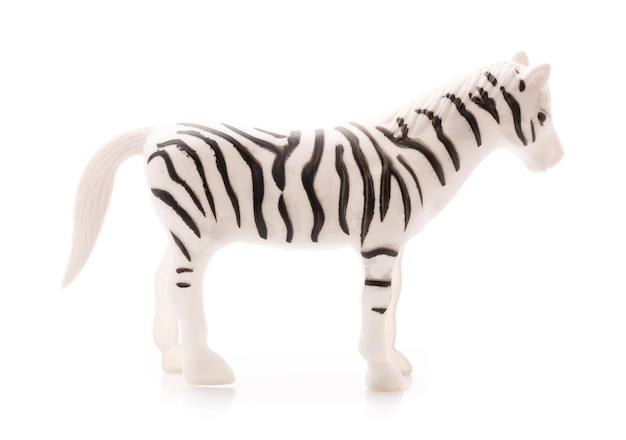 Zebra jouet en plastique isolé sur fond blanc