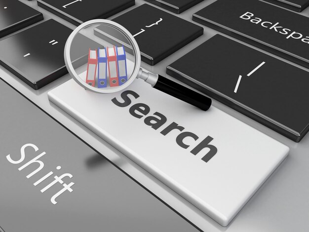 3d File folders and magnifying glass on the computer keyboard