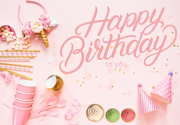 a background pattern with the words Happy Birthday to you written in pink handwriting suggesting it is a greeting card design