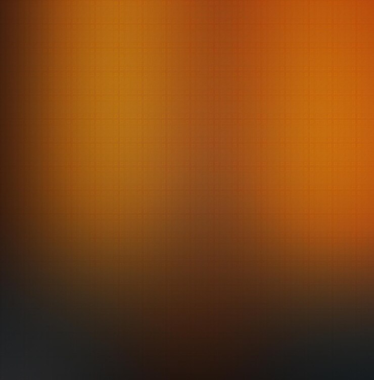 a blurry image of a yellow and orange background.
