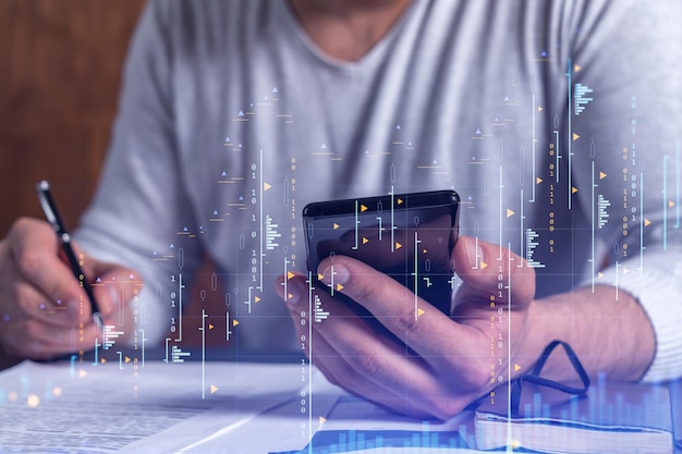 a client in casual wear is signing the contract to invest money in stock market internet trading and wealth management concept checking the details of transaction at smart phone