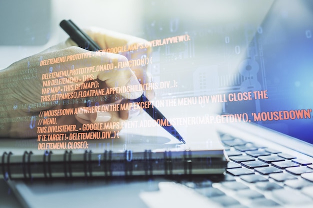 Abstract creative coding illustration with hand writing in diary on background with laptop software development concept Multiexposure