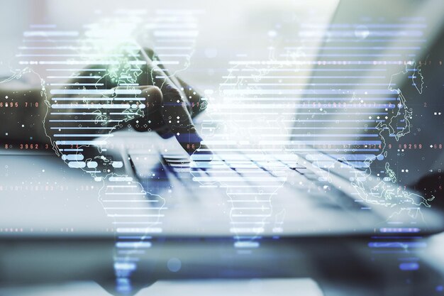 Abstract creative world map and hands typing on laptop on background international trading concept Multiexposure