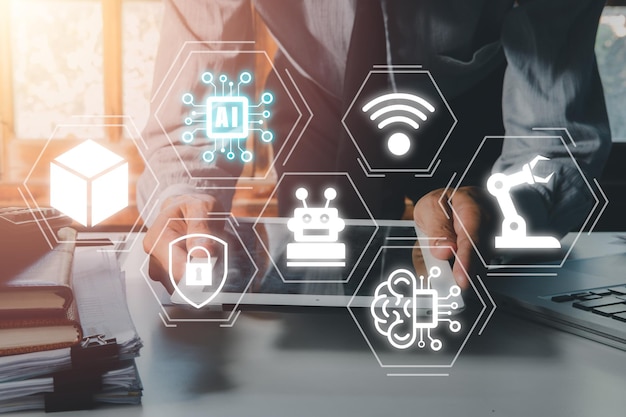 Artificial Intelligence AI Person hand using tablet with holographic brain Artificial Intelligence AI icon from the screen Internet of Things IoT concep