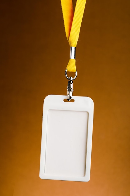 badge for identification with the name and a yellow cord empty space for text