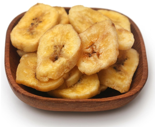 Banana chips isolated over white background
