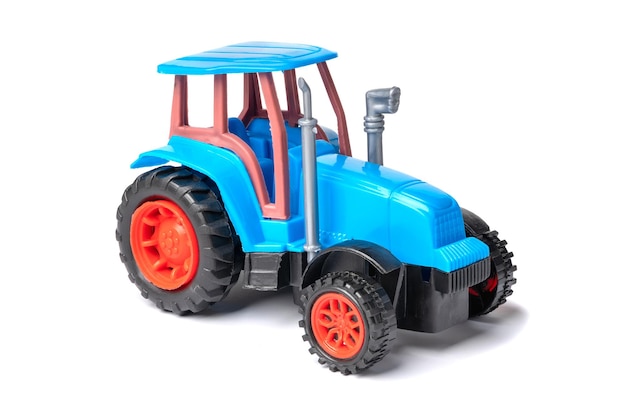 Blå traktor barneleke isolert på en hvit bakgrunn