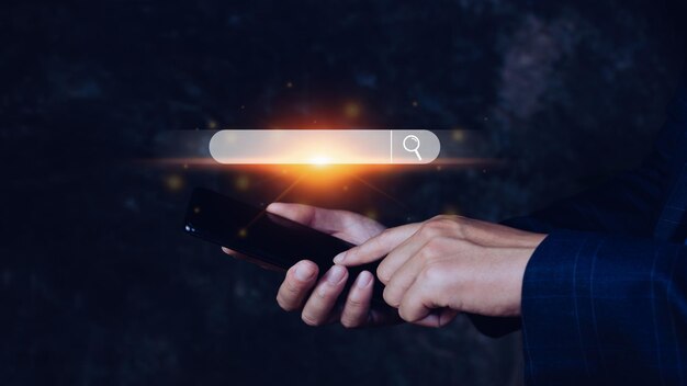 businessman touching smartphone data search box information technology search engine optimization uses a search box to search for information on the internet