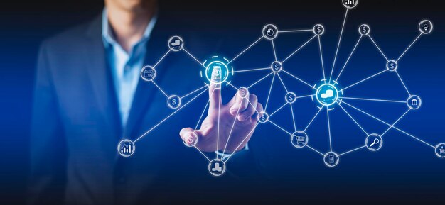 Businessman touchscreen money icon on the graph Screen Icon of a media screen, Technology Process System Business with spending planning and marketing concept, Team success, Banking and Finance.