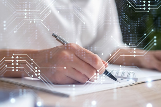 Businesswoman is writing down some ideas to create innovative software to change the world and provide a completely new service Close up shot Hologram tech graphs Concept of Dev team Formal wear
