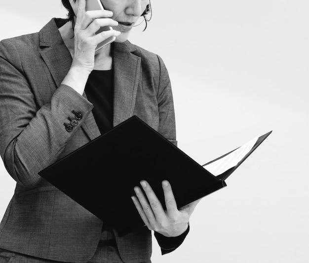 Businesswoman Talking Using Phone Working Busy