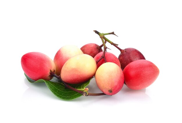 carissa carandas linn or bengal currants, fruits isolated on white background.