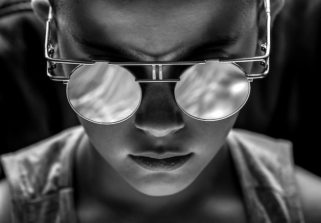 close-up of boy wearing sunglasses