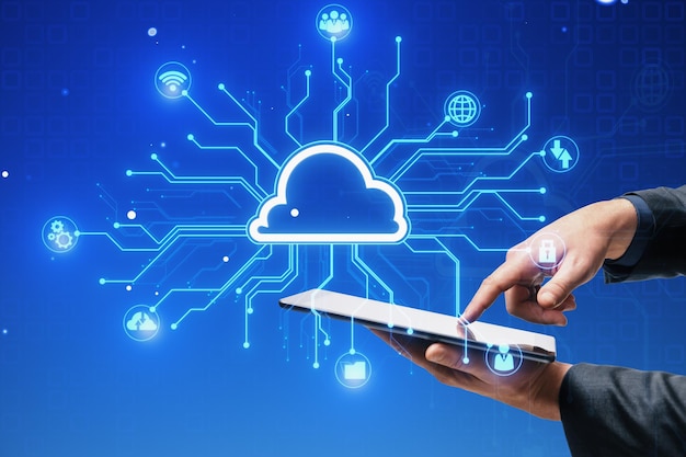 Close up of businessman hand using cellphone with creative digital circuit cloud on blue background Data storage server and technology concept