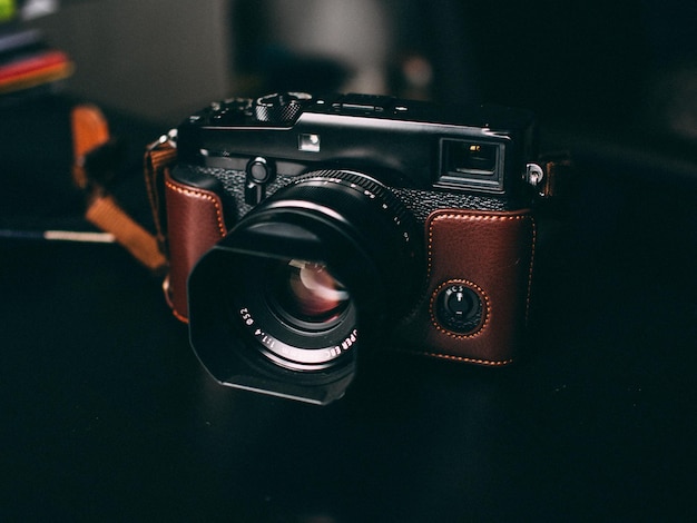 Close-up of camera on table