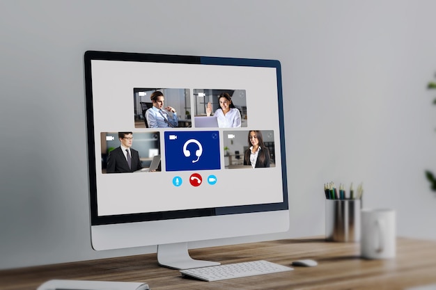 Close up of computer with creative video conference call on screen at workplace Work home and remote team concept