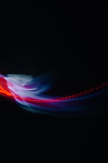 close-up of illuminated light over black background