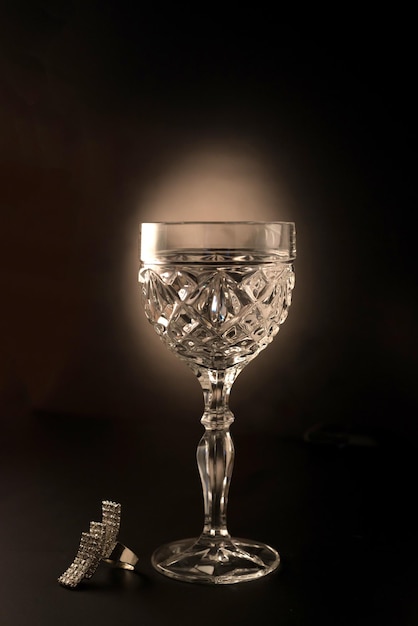 close-up of illuminated lighting equipment against black background