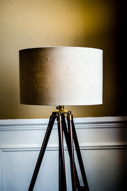 Close-up of lamp shade against the wall