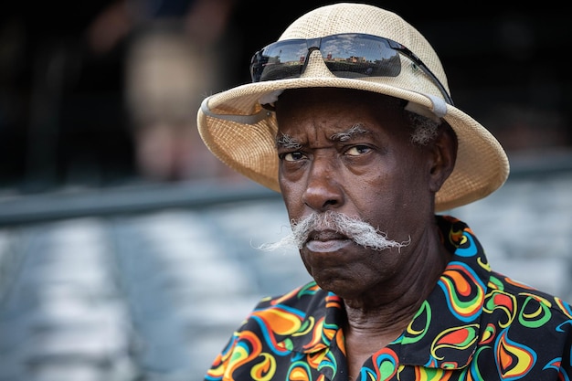 Close-up of man wearing hat