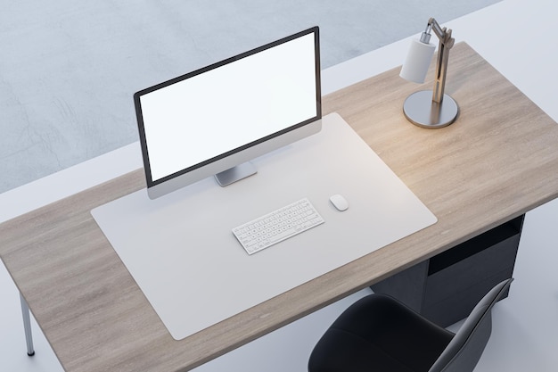 Close up of wooden office desktop with empty white computer monitor and mock up place for your advertisement lamp and keyboard on blurry background 3D Rendering